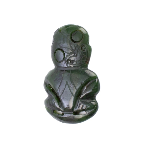 273 - A Maori carved nephrite hei-tiki pendant, New Zealand, probably early 20th century; of typical form,... 