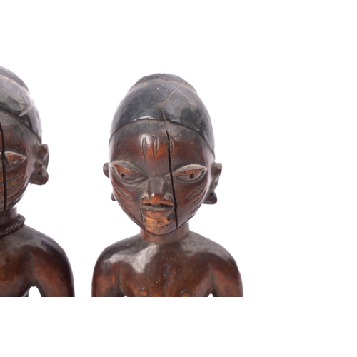 275 - A pair of West African carved and partially ebonised models of twin boys, 'Ibeji', Yoruba people, Ni... 