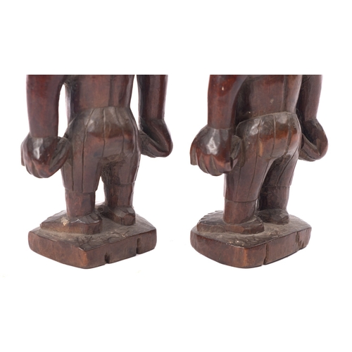 275 - A pair of West African carved and partially ebonised models of twin boys, 'Ibeji', Yoruba people, Ni... 