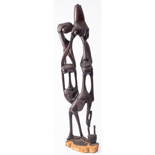 285 - Three carved hard wood family groups, Makonde People, east Africa, 20th century; comprising two open... 