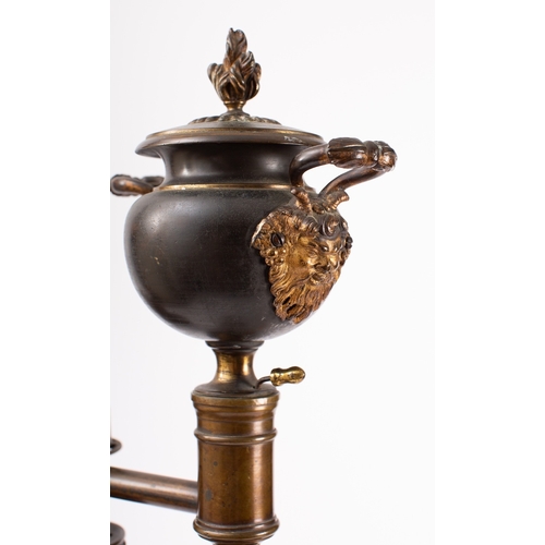 297 - A pair of George IV or William IV patinated and parcel gilt bronze table oil lamps, circa 1830; each... 