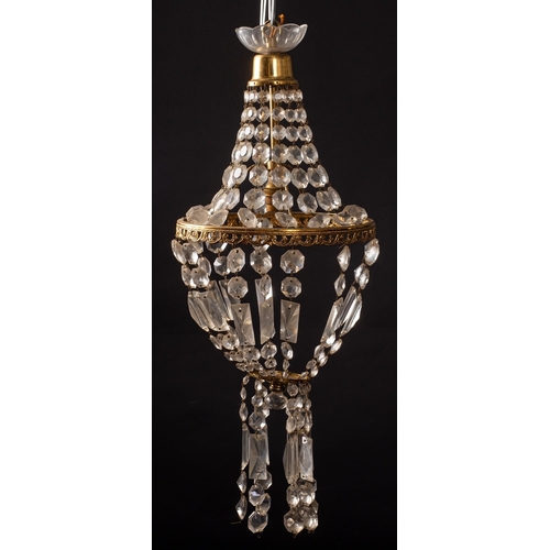 312 - A group of six metal and glass pendant hung ceiling lights, 20th century; comprising a set of three,... 