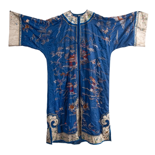 356A - A Chinese silk blue-ground robe and a pair of slippers embroidered overall with pavilions, birds, fl... 