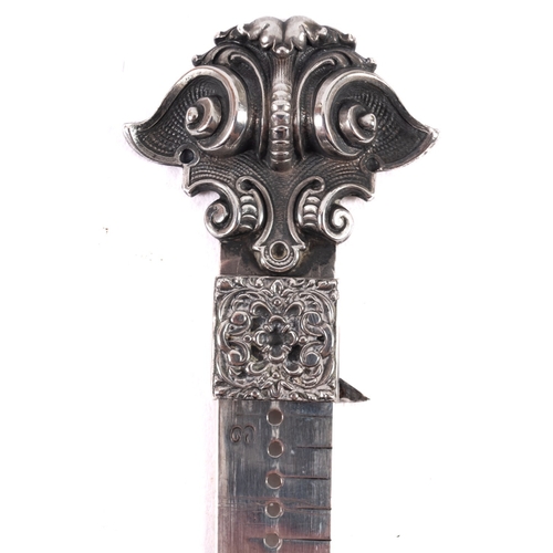 371 - A sterling silver pocket measure, with scroll and foliate terminal, 12cm long, inscribed 'Pat. Oct. ... 