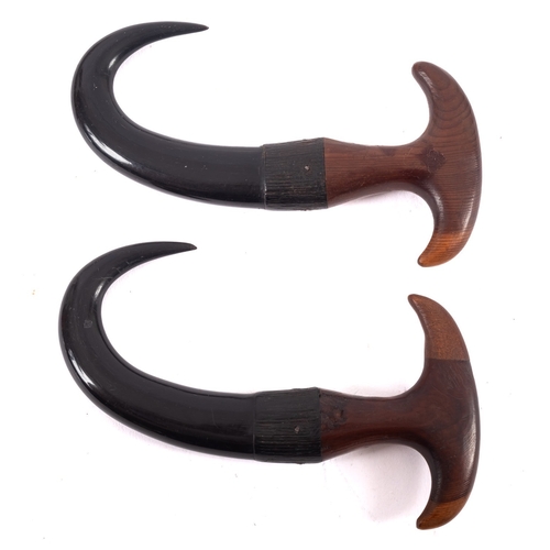 395 - A pair of 19th Century horn boot pulls, initialled R.I.G.I, 13cm long.  Provenance:  The Christopher... 