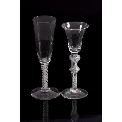 4 - Two Dutch wine glasses comprising a bell shaped example on a double knobbed air twist stem on a redu... 