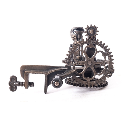 402 - A bench mounted cast iron mechanical apple peeler, made in U.S.A by SInclair Scott Co., Baltimore.  ... 