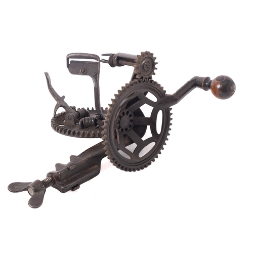 403 - A bench mounted cast iron mechanical apple peeler, by C. E. Hudson, Leominster, Mass.  Provenance:  ... 