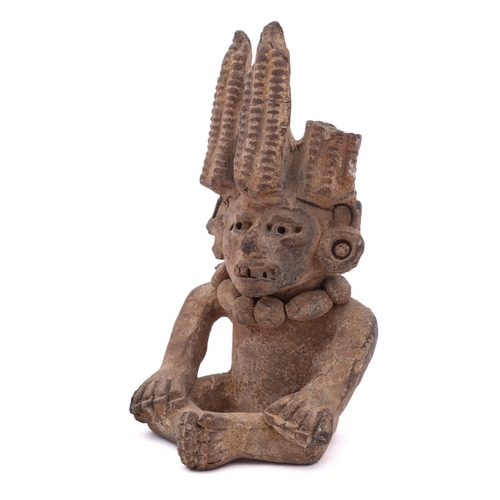 41 - A Pre-Colombian/Mayan pottery vessel of Hun Hunahpu in seated posture wearing a maize head dress, 17... 