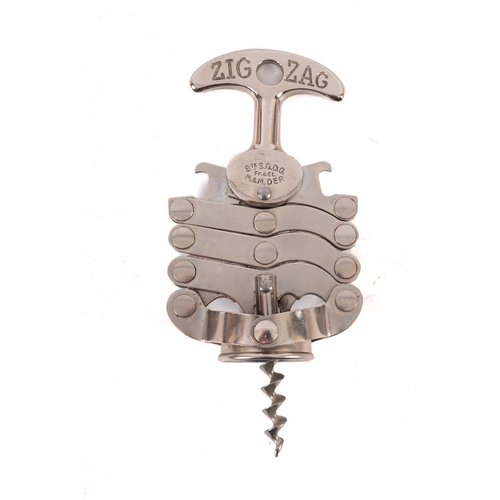 427 - A French polished steel zig-zag corkscrew, inscribed 'Bte SGDG Fr & Et M & M Dep, with original labe... 