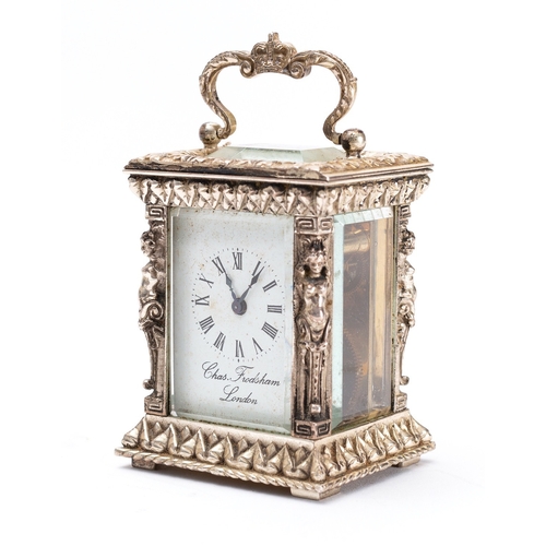 446 - Charles Frodsham, London, a modern miniature silver carriage clock having an eight-day duration time... 