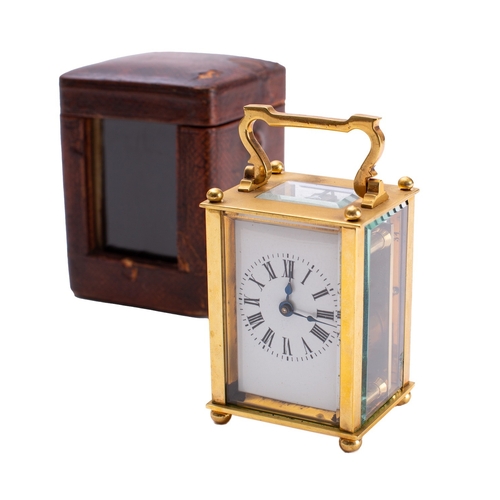 456 - An Edwardian brass miniature carriage timepiece the eight-day duration timepiece movement having a p... 