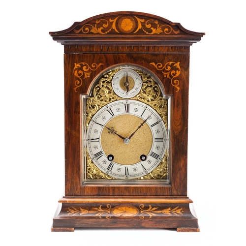 482 - Lenzkirch, an inlaid walnut mantel clock the eight-day duration movement striking the quarters on tw... 