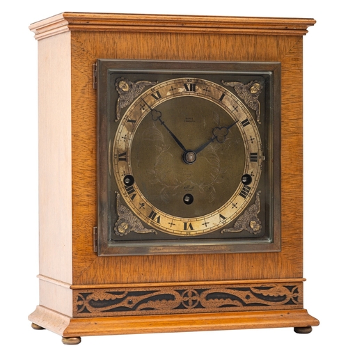 496 - Elliott a 20th century walnut chiming mantel clock for Boyce of Exmouth having an eight-day duration... 