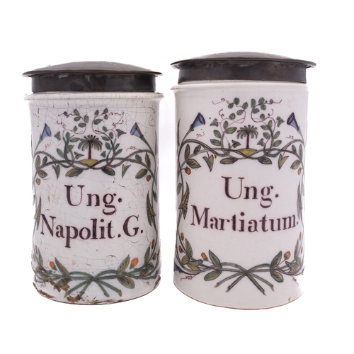 50 - A pair of Italian polychrome maiolica alborelli of cylindrical form inscribed 'Ung.Napolit.G.' and '... 