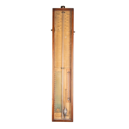 551 - An oak cased Admiral Fitzroy's barometer the paper dials showing barometric rises and falls along wi... 