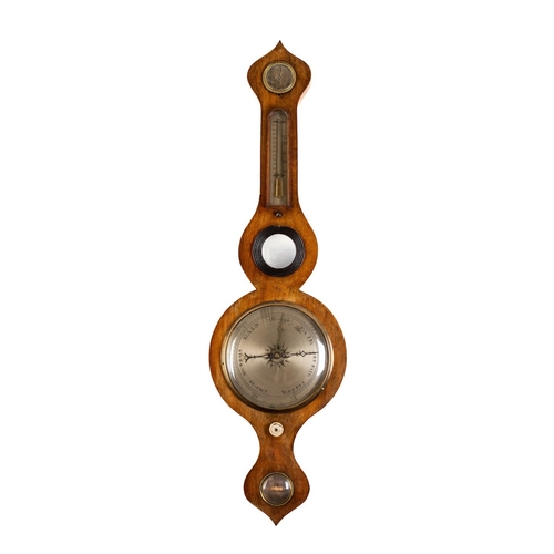 552 - An oak five-dial wheel barometer the eight-inch silvered dial with usual barometer markings, the oak... 