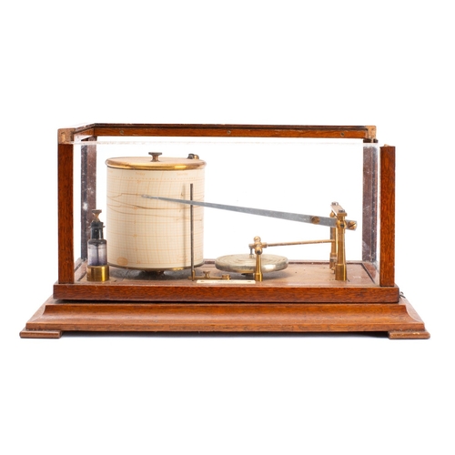 553 - A wooden cased barograph in distressed condition, with attached bone plaque for Gibson Ltd, Belfast,... 