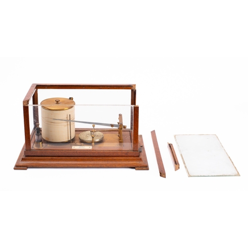 553 - A wooden cased barograph in distressed condition, with attached bone plaque for Gibson Ltd, Belfast,... 