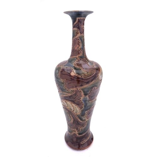 61 - A Royal Doulton stoneware vase of slender baluster form incised with stylised foliage and inscribed ... 