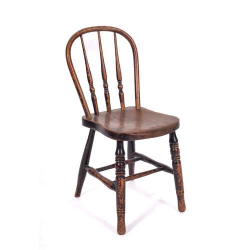 770 - A child's 19th Century elm, ash and beechwood stick back Windsor chair, with ring turned vertical sp... 