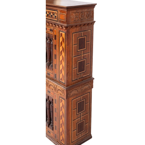 784 - A George V walnut and parquetry cupboard in 17th century taste, dated 1928; with moulded cornice abo... 