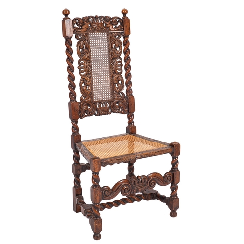 793 - A carved oak and caned side chair in William & Mary style, late 19th century; the backrest with open... 