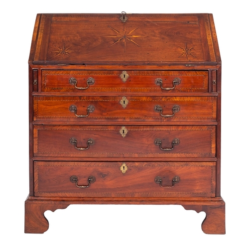 798 - A George II walnut bureau, circa 1740; the fall crossbanded and chequer-strung, inlaid with sunburst... 