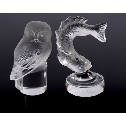 8 - Two Lalique frosted and clear glass paperweights in the form of a barn owl and a leaping fish, etche... 