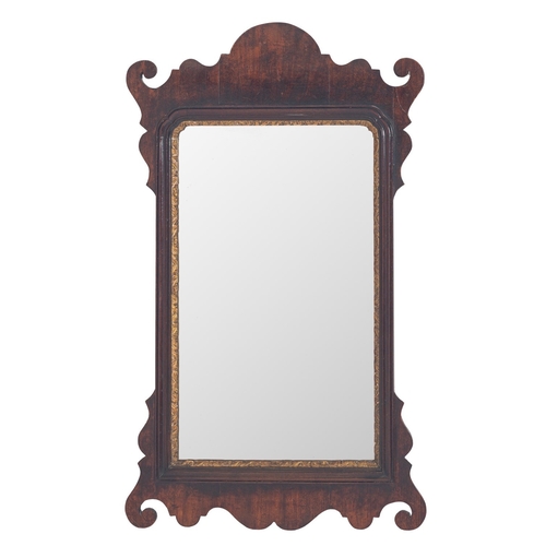 809 - A mahogany framed rectangular wall mirror in George I style, 19th century; with fret-cut surround, r... 