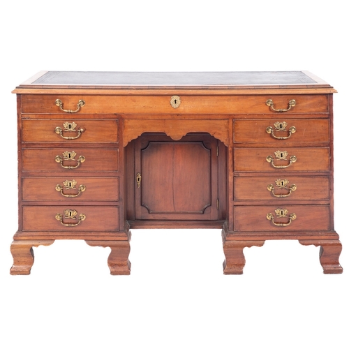 816 - A Victorian mahogany desk in George II style, circa 1870; the top with inset faux leather skiver and... 