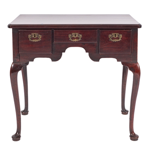 818 - A George II mahogany 'lowboy' side table, circa 1740;  the rectangular top with moulded edges and re... 