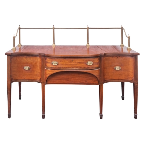 826 - A Victorian mahogany serpentine front sideboard in George III style, 19th century; the gilt brass op... 