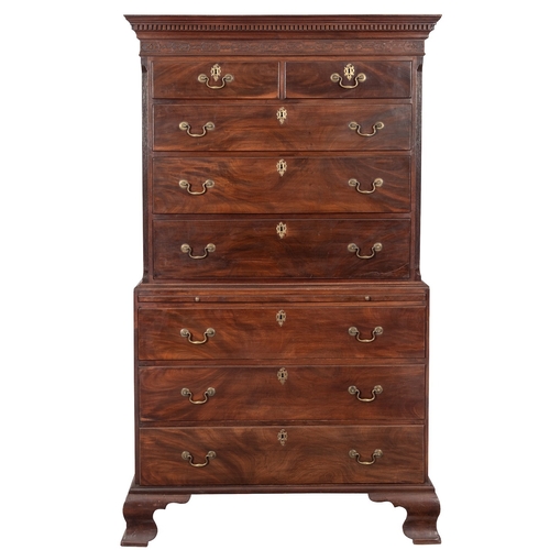 828 - A George III mahogany chest on chest, late 18th century; the upper part with dentil moulded cornice ... 