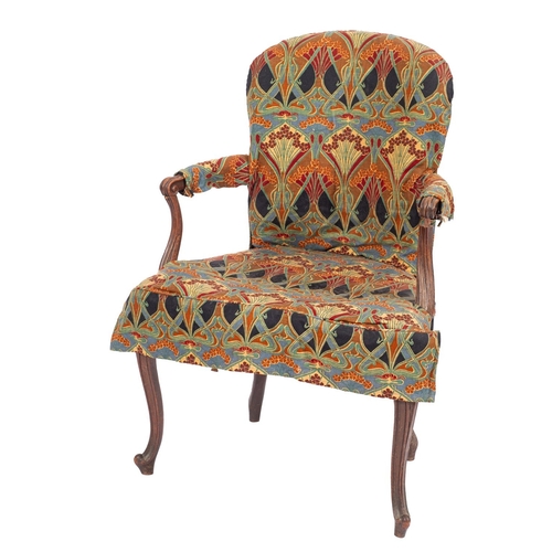 841 - A George III mahogany open armchair in the French Hepplewhite manner, with an upholstered cartouche-... 