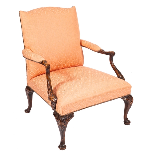 846 - A carved walnut and upholstered Gainsborough armchair in George III style, 19th century; later re-co... 