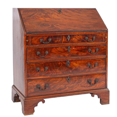 854 - A George III mahogany bureau, the sloping hinged fall enclosing a fitted interior, with small drawer... 