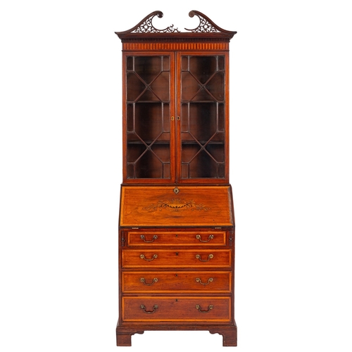 865 - A mahogany, marquetry and glazed bureau bookcase, in George III style, 19th century; with openwork s... 