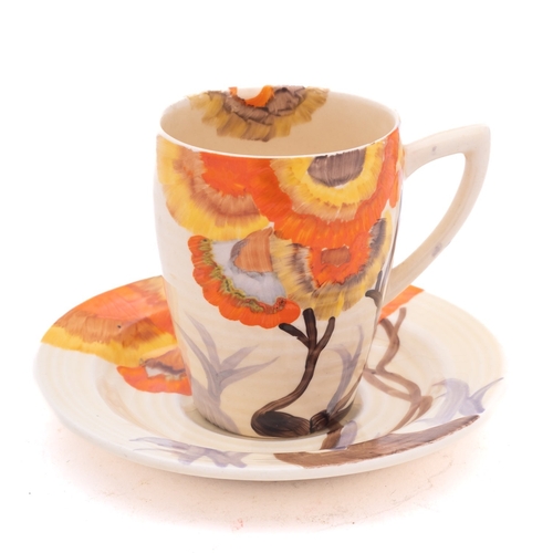 87 - A Clarice Cliff Bizarre cup and saucer decorated in the 'Rhodanthe' pattern, printed marks, circa 19... 