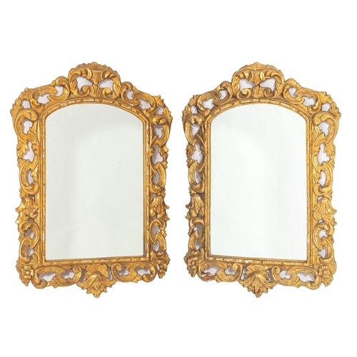 880 - A pair of carved and giltwood framed wall mirrors in 18th Century taste, probably Spanish, 20th cent... 