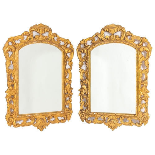 881 - A pair of carved and giltwood framed wall mirrors in 18th Century taste, probably Spanish, 20th cent... 