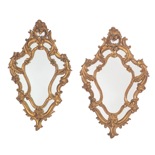 892 - A pair of Italian carved and giltwood framed marginal wall mirrors, in 18th century style, 20th cent... 