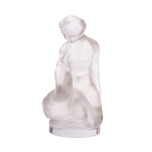 9 - A Lalique Cristal figure of Leda and the swan modelled in kneeling posture, 12cm high, acid etched L... 