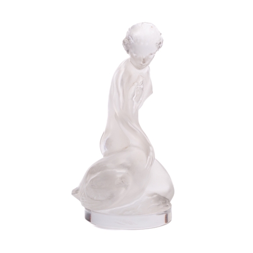 9 - A Lalique Cristal figure of Leda and the swan modelled in kneeling posture, 12cm high, acid etched L... 