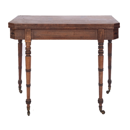 910 - A Regency mahogany and inlaid rectangular card table, bordered with ebonised lines, the baize lined ... 