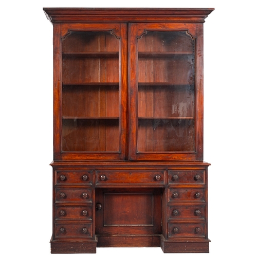 911 - A Regency mahogany and glazed cabinet bookcase, early 19th century; with moulded cornice above twin ... 