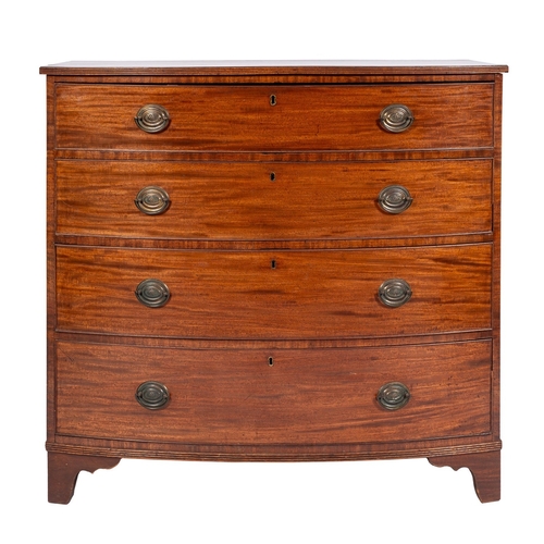 930 - A Regency mahogany bowfront chest of drawers, early 19th century; the top with reeded edges, above f... 