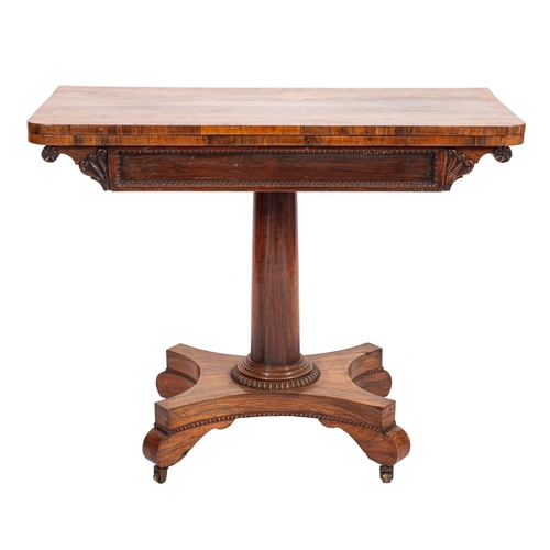 931 - A late Regency rosewood rectangular card table, the baize lined and banded and crossbanded hinged to... 