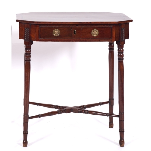 935 - A Regency mahogany and inlaid octagonal work table, with a crossbanded and ebony strung top, fitted ... 