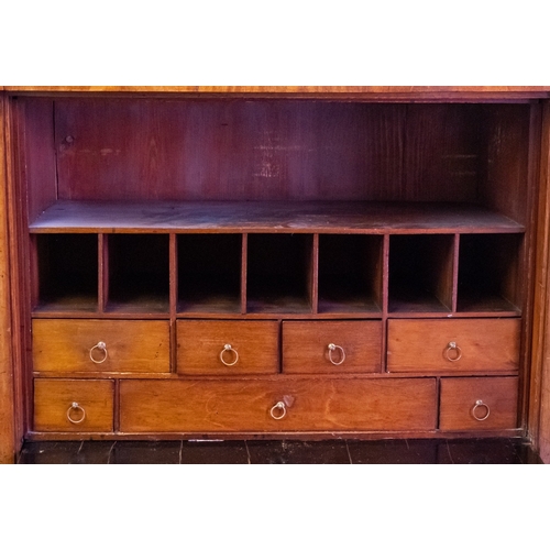 952 - A Louis Philippe secretaire á abbatant, circa 1840; with mottled black marble top above a blind frie... 